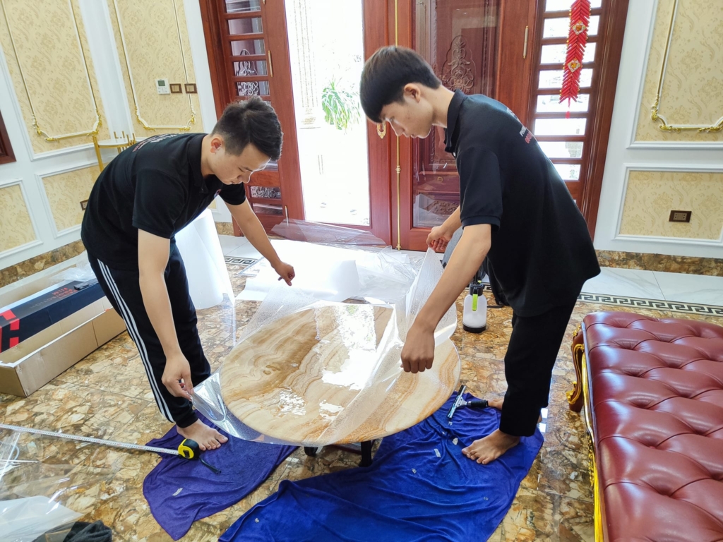 dán phim bảo vệ mặt bàn tại Hưng yên