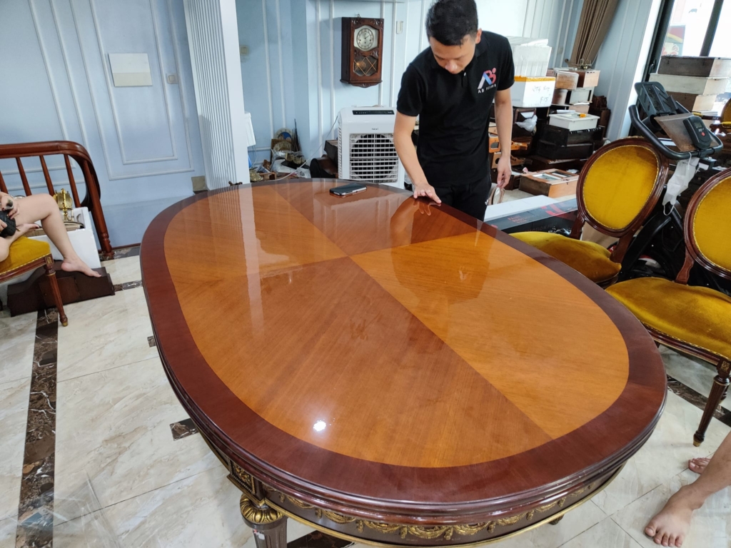 thi công dán phim bảo vệ mặt bàn tại long biên