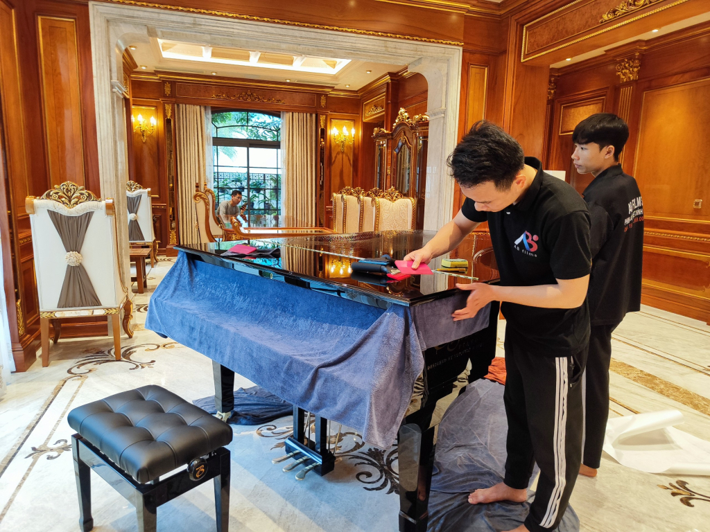 dán phim bảo vệ piano